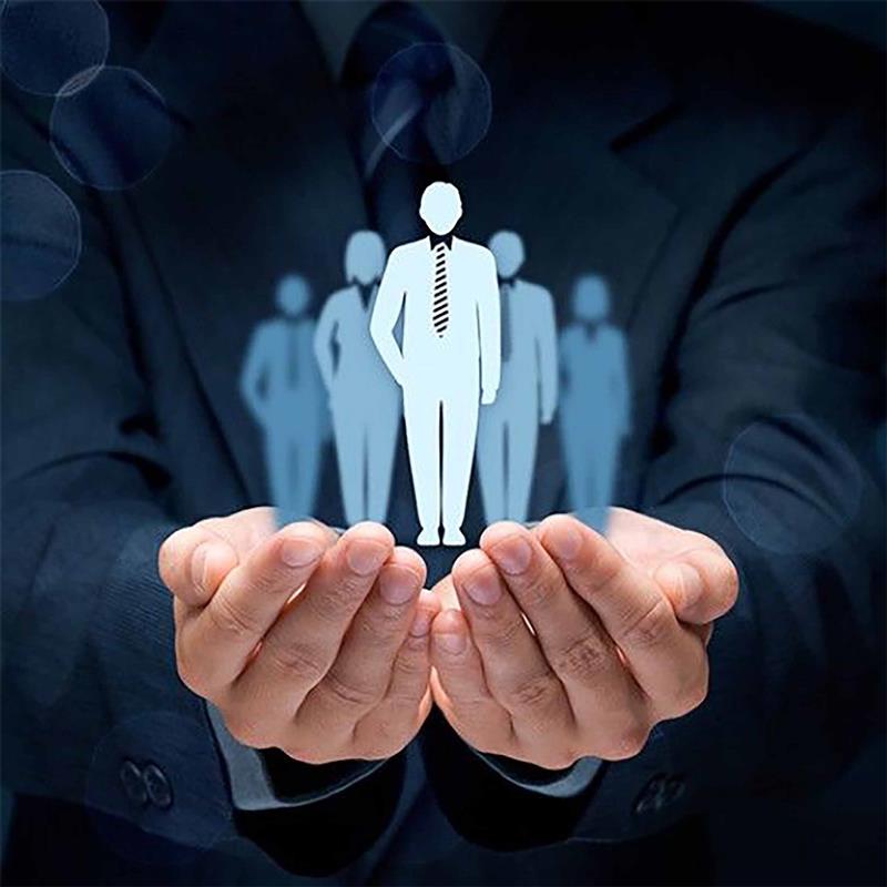 Three people are standing